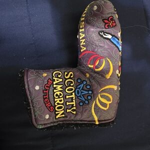 Scotty Cameron Purple Putter Cover with Yellow and Red Accents